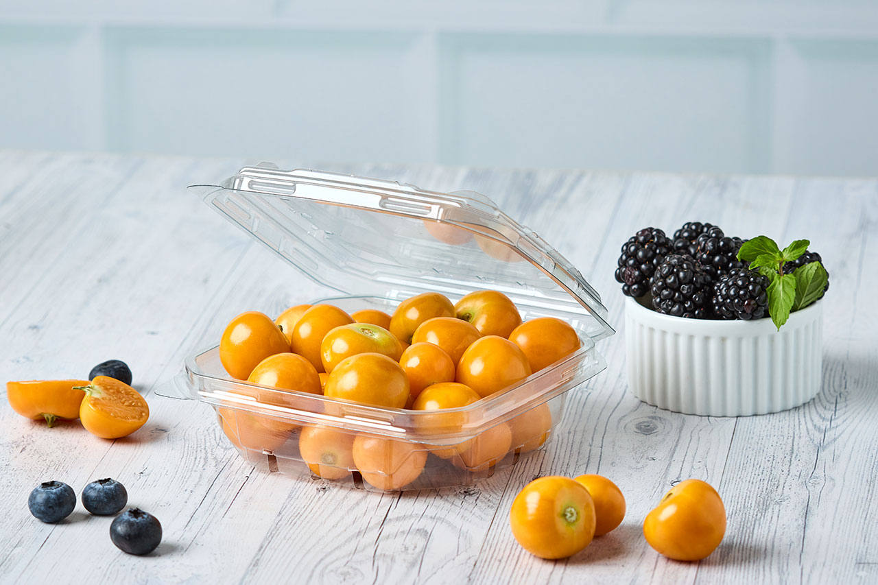 Empaque para frutas y hortalizas con sistema de ventilación, ideal para conservar, proteger y exhibir los alimentos frescos por más tiempo.