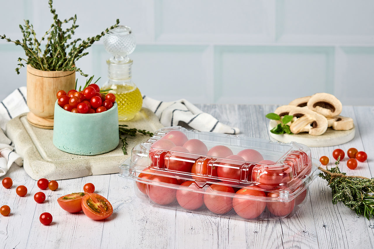 Empaque para frutas y hortalizas con sistema de ventilación, ideal para conservar, proteger y exhibir los alimentos frescos por más tiempo.