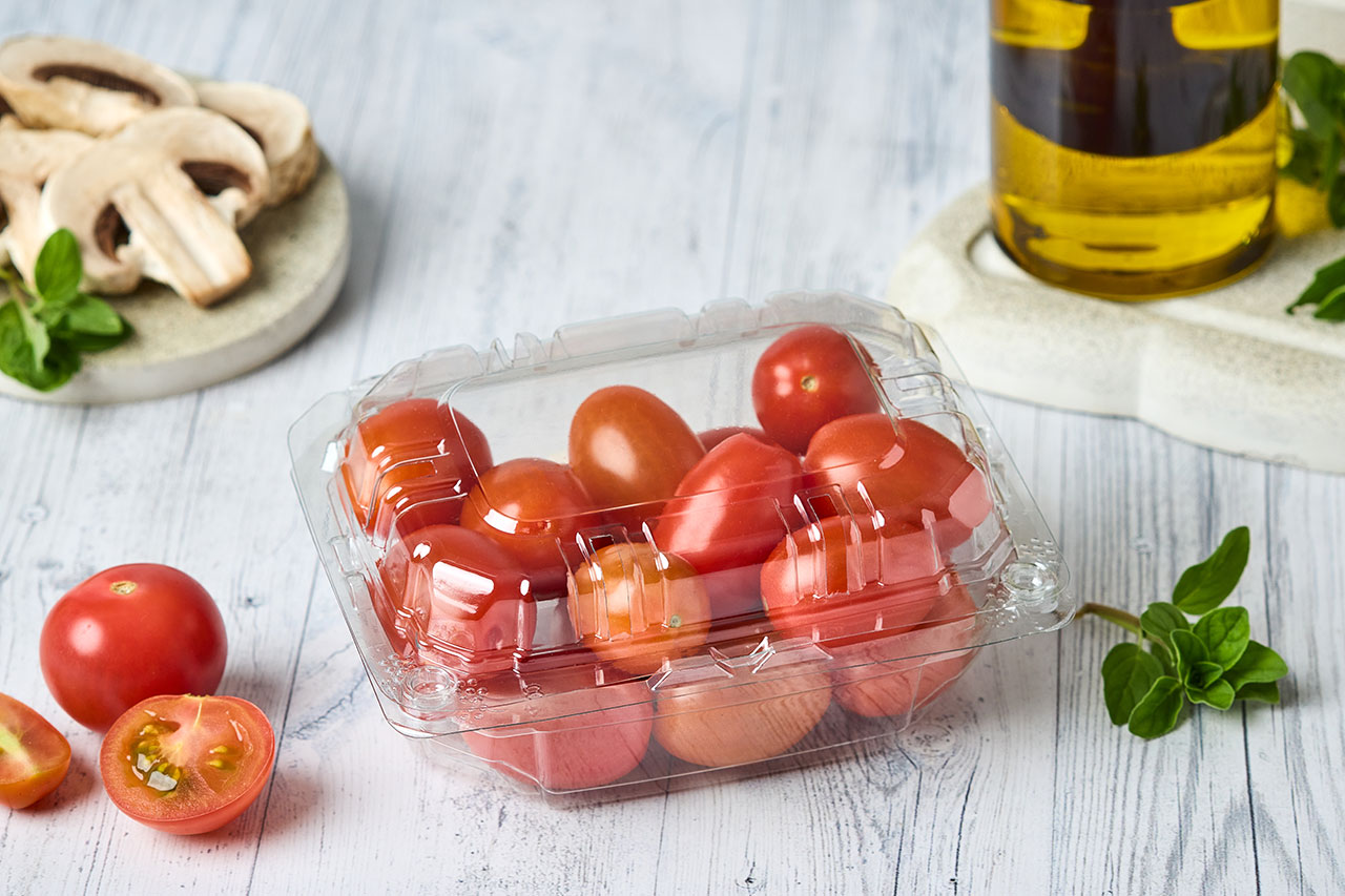 Empaque para frutas y hortalizas con sistema de ventilación, ideal para conservar, proteger y exhibir los alimentos frescos por más tiempo.